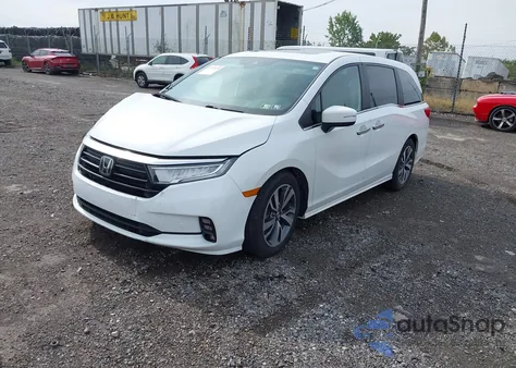 2023 Honda Odyssey Touring z USA, uszkodzony, nr VIN 5FNRL6H80PB004704